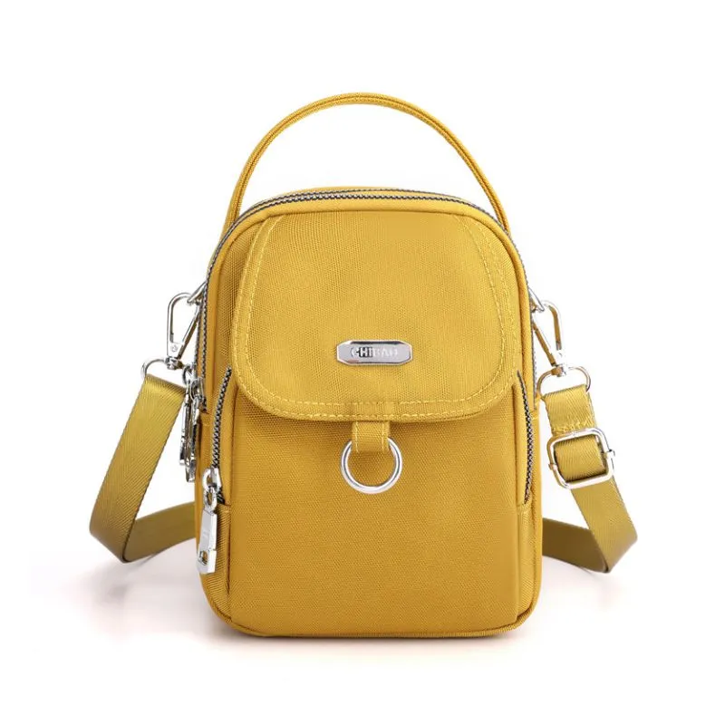 Light and waterproof shoulder bag with several pockets