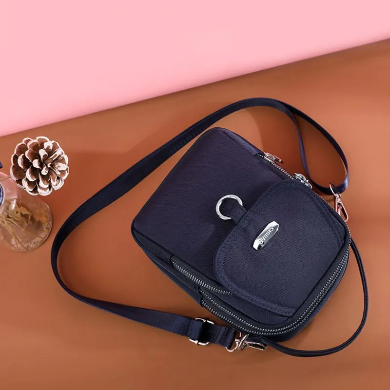 Light and waterproof shoulder bag with several pockets