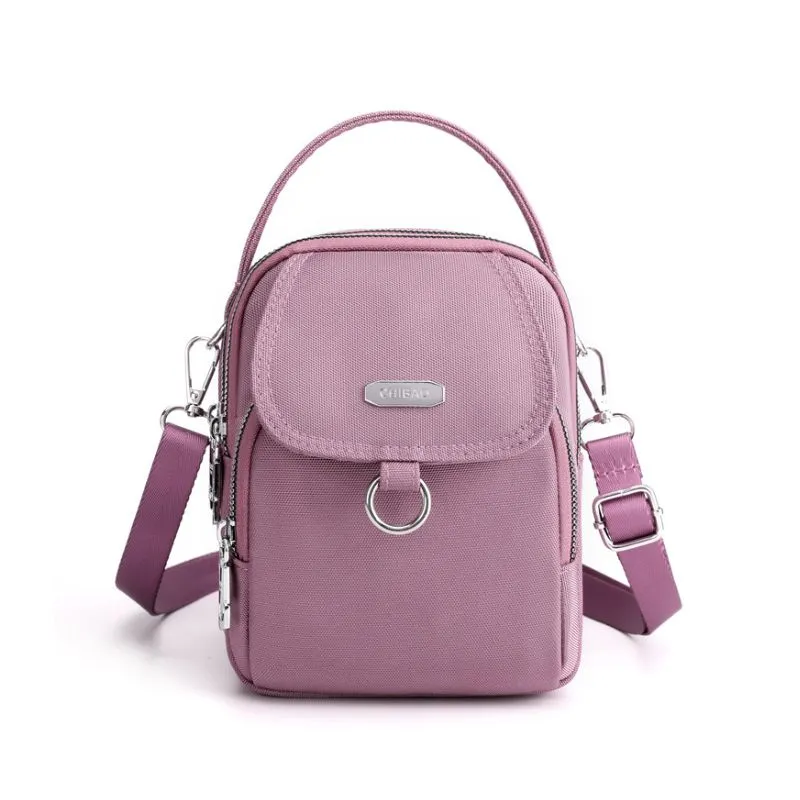 Light and waterproof shoulder bag with several pockets