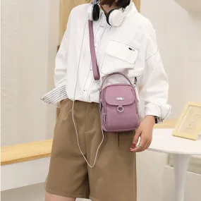 Light and waterproof shoulder bag with several pockets