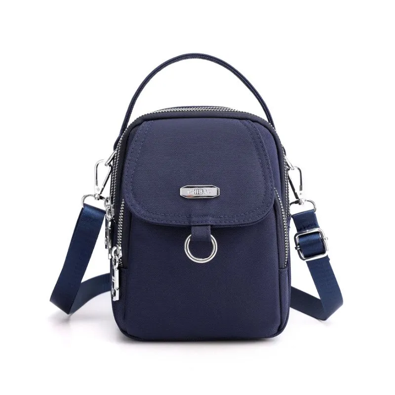 Light and waterproof shoulder bag with several pockets