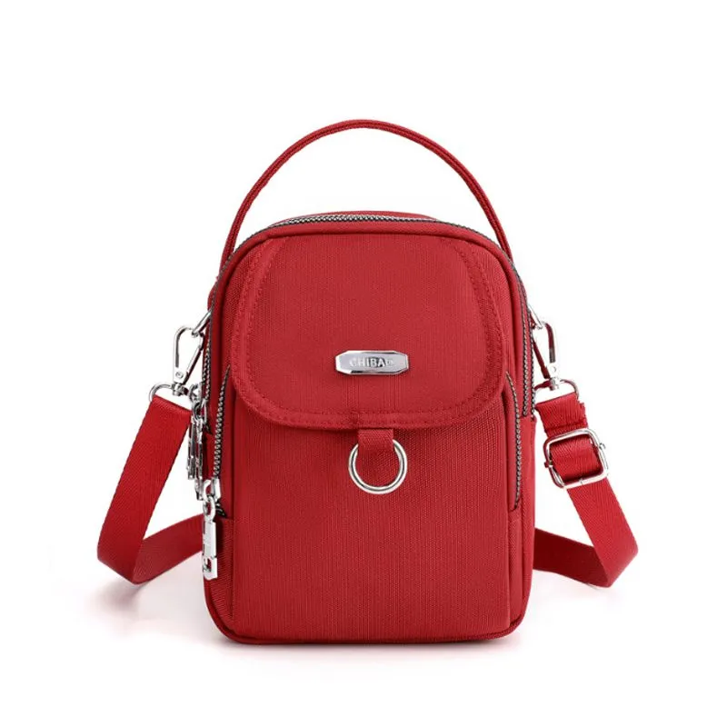 Light and waterproof shoulder bag with several pockets